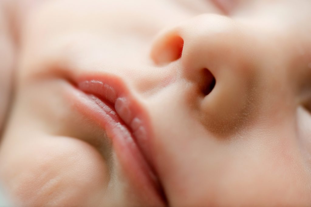 macro detail shot of baby lips sweet baby details lane weichman springville al newborn photographer

